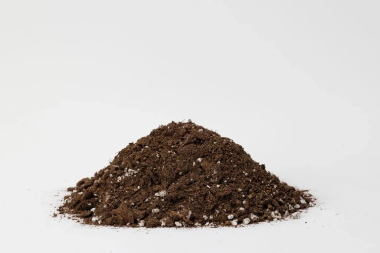 Pile of Sunshine 4 RSi premium potting mix with perlite and coconut coir on white background for container gardening